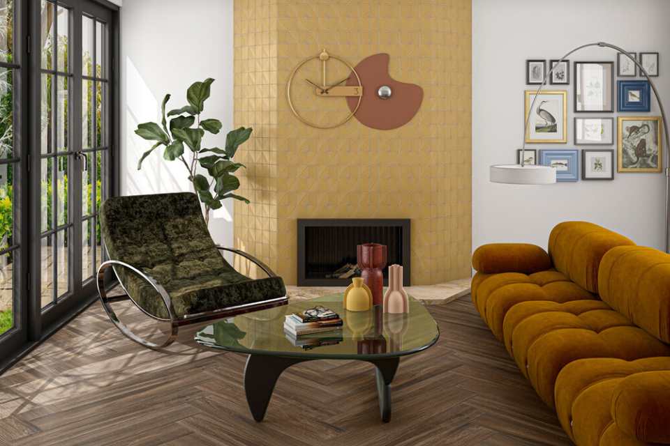 dark herringbone floor in retro living room with velvet seating and yellow tile fireplace surround